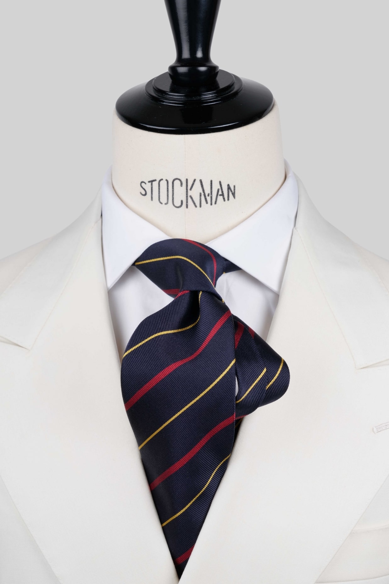 Cravate sartoriale à 3 plis, soie tissée bleu marine, rayures doré et rouge