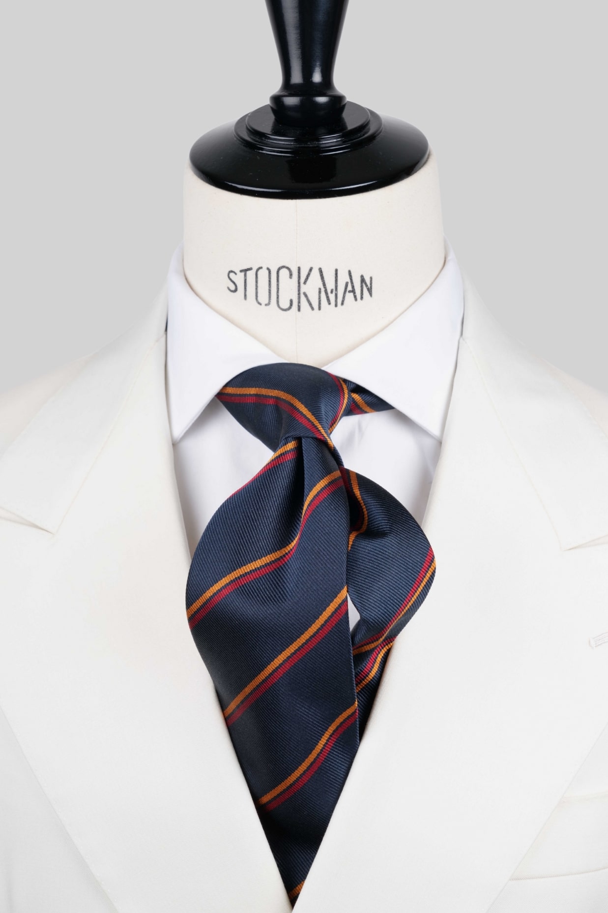 Cravate sartoriale à 3 plis, soie tissée bleu marine, rayures orange et bordeaux